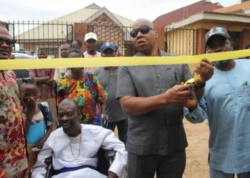 GOVERNOR MAKINDE GIFTS PHYSICALLY CHALLENGED CCC MEMBER, PROPHET OLUWADAISI CHESIRE, HOUSE KEYS AND WHEELCHAIR